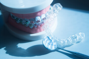 Invisible bracket aligners