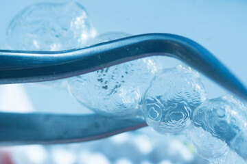 Invisible bracket aligners