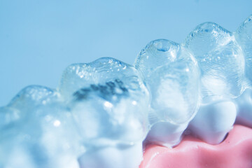 Invisible bracket aligners