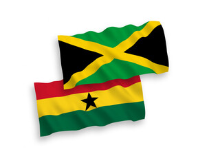 National vector fabric wave flags of Jamaica and Ghana isolated on white background. 1 to 2 proportion.