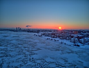Drone sunset over winter city
