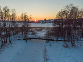 Sunset over the city in winter