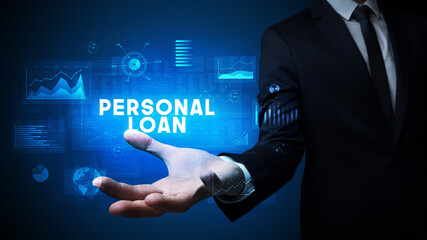 Hand of Businessman holding PERSONAL LOAN inscription, business success concept