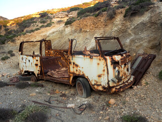 Rusty old minibus/van abandoned broken on a Greek island