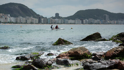 Fototapeta na wymiar Citizens of the canoe. Copacabana Fort