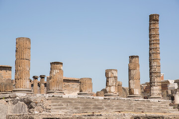 Fototapeta premium View of the columns in the foro of Pompeii's remains, the ancient Roman city.