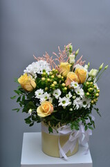 fresh flowers in paper boxes