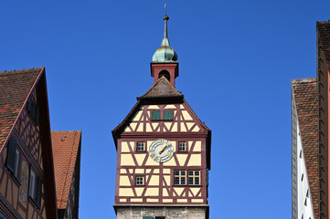 Josenturm, a historical half-timbered tower with a clock at the facade, in the old town of...