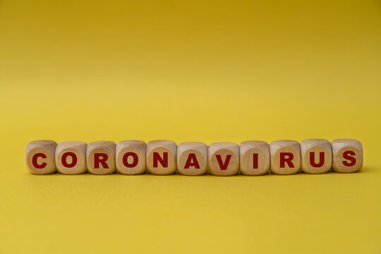 Coronavirus written on wooden blocks.