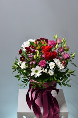 fresh flowers in paper boxes