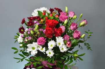 fresh flowers in paper boxes