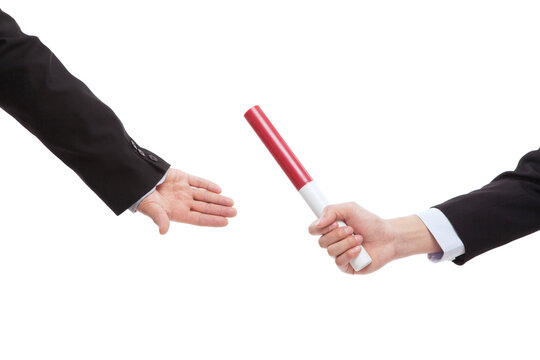 Business People In Passing The Baton