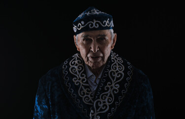 Kazakh old man in national clothes