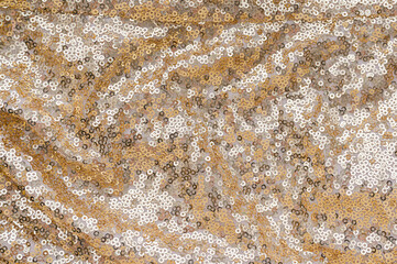 fabric texture with shiny sequins close up