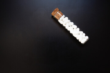 Jordan almonds in glass tube, wedding decoration