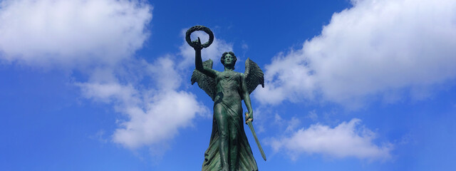 Ultra wide photo from famous National Resistance Monument statue in port of Syros island, Ermoupoli, Cyclades, Greece