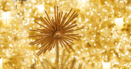 Christmas tree decoration in gold color