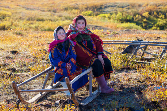 The extreme north, Yamal, the past of Nenets people, the dwelling of the peoples of the north, a family photo near the yurt in the tundra.