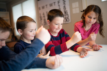 kids celebrating winning and losing a game together
