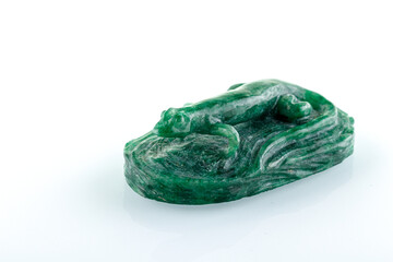 beautiful statuette of lizard salamander from malachite on a white background