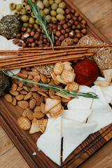 welcome buffet with alcohol and snacks, sandwiches, cupcakes