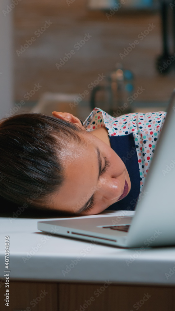 Poster exhausted overload business woman falling asleep on desk with open laptop monitor while working from