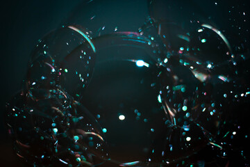 Abstract background and texture of blue bubbles with light illumination. The art of water surface for your products display and artwork design with copy space. Watery glare like jewelry so beautiful.