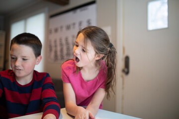 kids celebrating winning and losing a game together