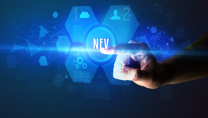 Hand touching NFV inscription, new technology concept