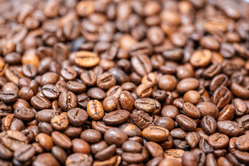 coffee beans close-up, foreground and background blurred, focus on middle