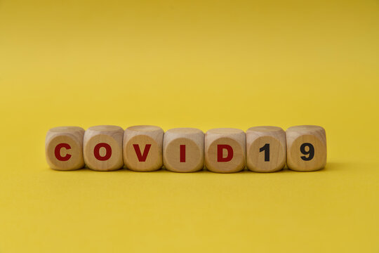 Covid-19 written on wooden blocks.