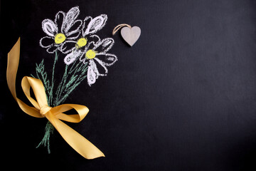 Postcard for the holiday of Valentine's Day, birthday, women's day. Blackboard with chalk-drawn flowers. Banner, postcard.