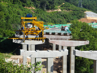 PENANG, MALAYSIA - MARCH 21, 2020: Overhead road under construction. The massive concrete column used to support the concrete road deck. Construction work is in full swing.