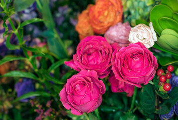 Close-up of a mixed bouquet of roses,summer flowers background.