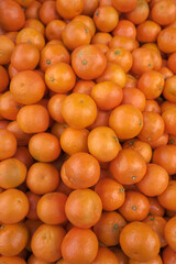 Background of fresh juicy clementine mandarins