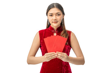 Happy beautiful young Chinese woman in red chinese dress holding red money envelopes against white background with copyspace