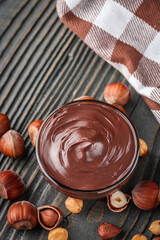 toasts with chocolate butter on a dark wooden rustic background