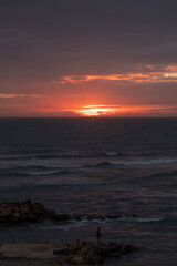 Fototapeta na wymiar Dramatic sunset on the sea