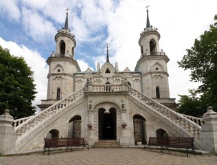 Fototapeta premium White-stone Vladimir Church in pseudo-Gothic style in Bykovo, Moscow region, Russia