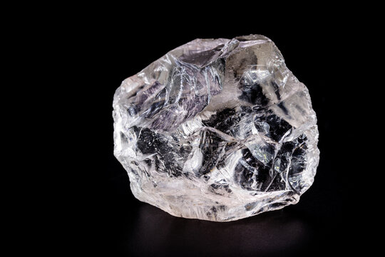 rough diamond, crystal in an allotropic form of carbon, uncut gemstone,  concept of luxury or wealth Stock Photo