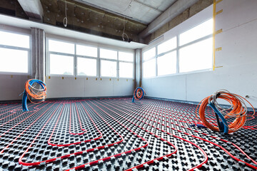 Floor heating and electrical outputs in a new building. Interior design