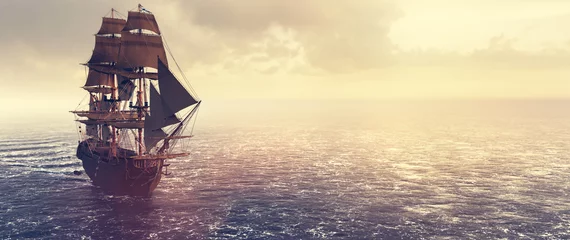 Fototapeten Piratenschiff segelt bei Sonnenuntergang auf dem Ozean © Photocreo Bednarek