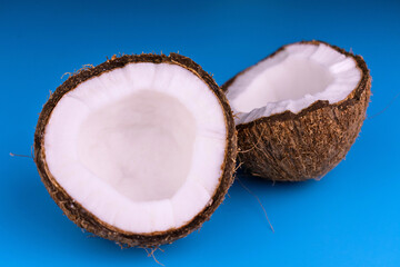 
Coconut on a light blue background.
Close-up.