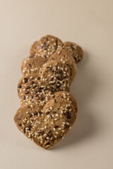 Tasty Heart of the Cookies on Yellow Background Cookies in Shape of Hearts Vertical Close Up