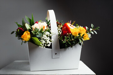 A bouquet of flowers in a basket