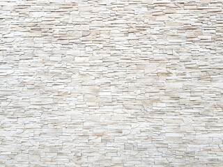 Sandstone brick wall texture and background.