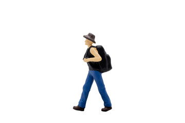 Miniature people traveller standing isolated on white background with clipping path