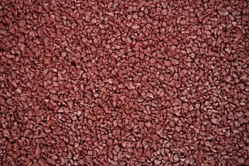 Close up Full Frame Shot in red runing track rubber texture
