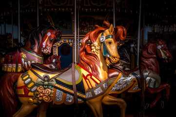 Fototapeta na wymiar Jane’s Carousel a landmark attraction beautifully restored antique 48-horse carousel enclosed within a sleek glass pavilion overlooking the Brooklyn Bridge.