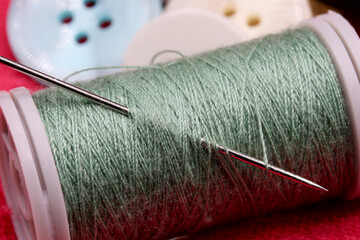 sewing accessories on a fabric background